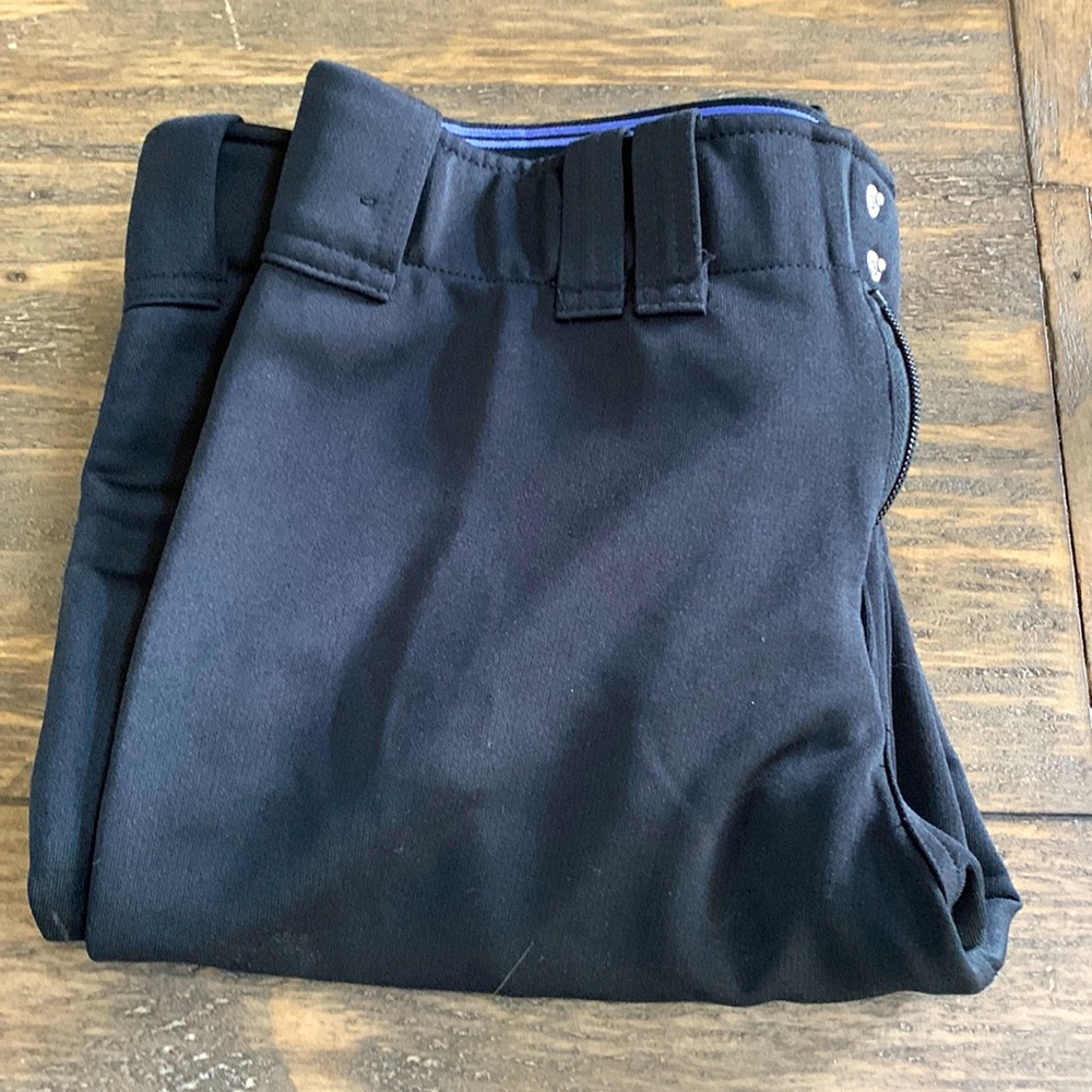 Black softball pants.